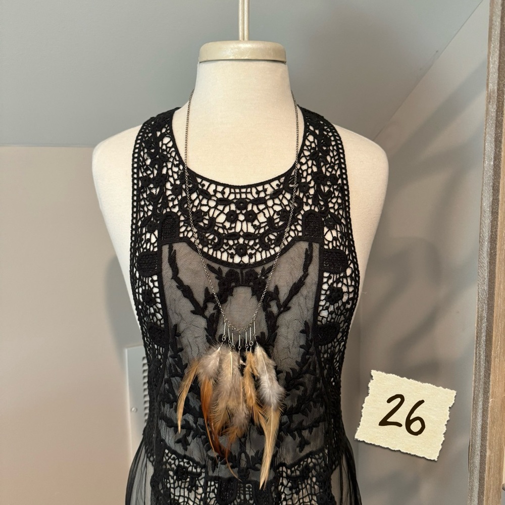 Long feather necklace.
